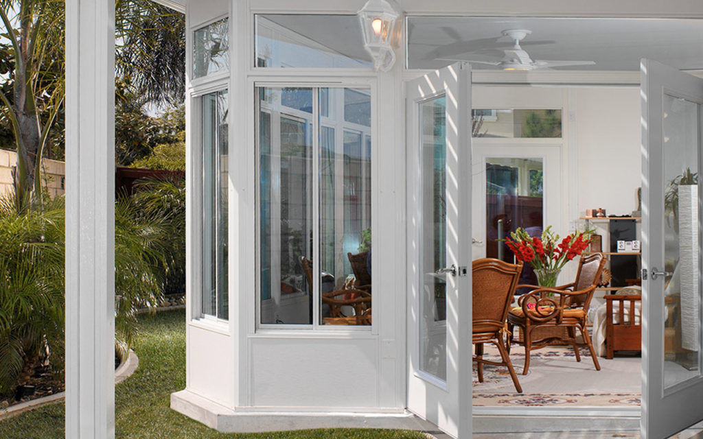 An interior view of a sunroom is shown like the type Mico Construction of Fresno, CA builds.